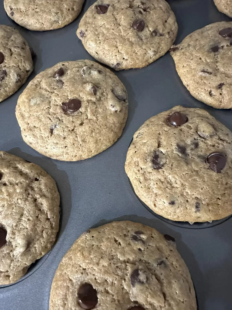 Image of chocolate chip muffins in muffin tin.